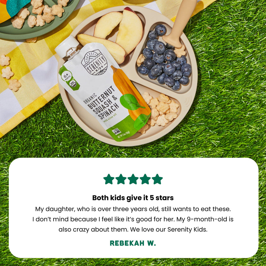 Serenity Kids Butternut squash and spinach food packaging on a plate with fruits and a five-star review from customer. 