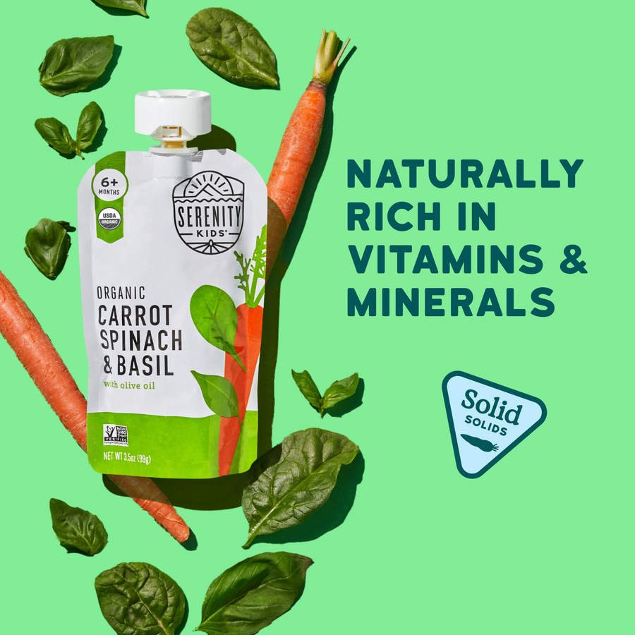 Serenity Kids organic pouch with carrots, spinach, and basil on a green background