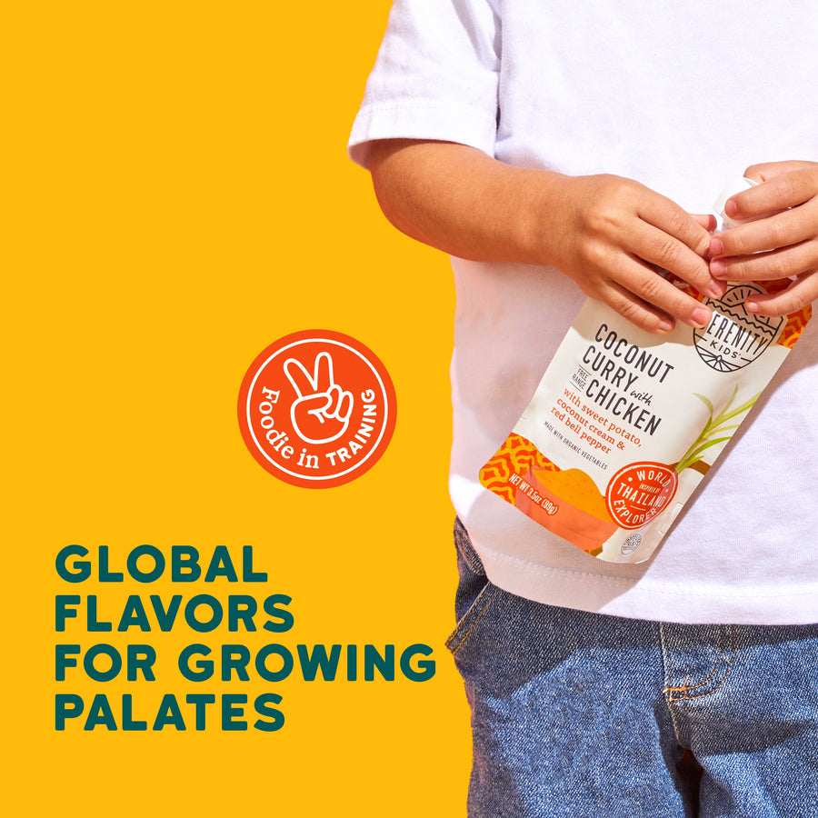 Child holding a Coconut Curry with Chicken baby food with text 'Global Flavors for Growing Palates' on a yellow background