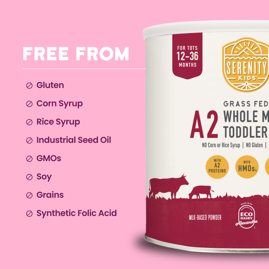 Serenity Kids A2 Whole Milk Toddler Powder can on a pink background with free-from allergen list.