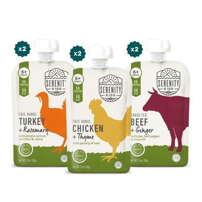 Three Serenity Kids food pouches with chicken, beef, and turkey illustrations on a white background