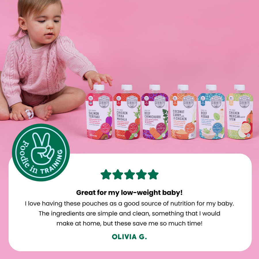 Baby sitting next to world explorer baby food pouches with a 5 star customer review on a pink background