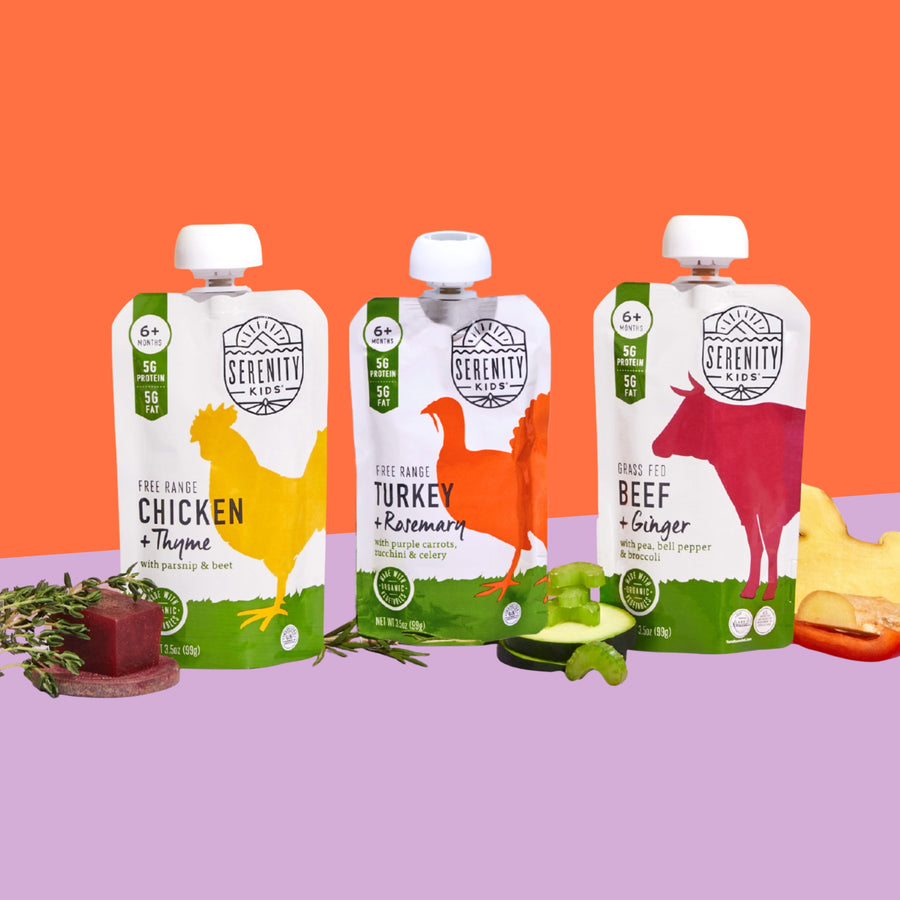 Three Serenity Kids food pouches on a colorful background