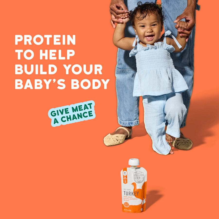 Child being held by an adult with a protein product packaging on an orange background